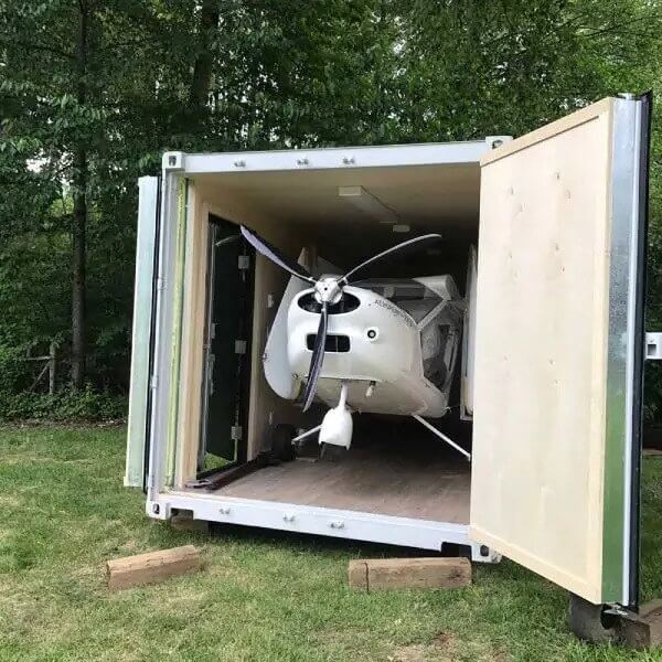 Flight school classroom by summer, airplane storage unit by winter - Backstorage Containers